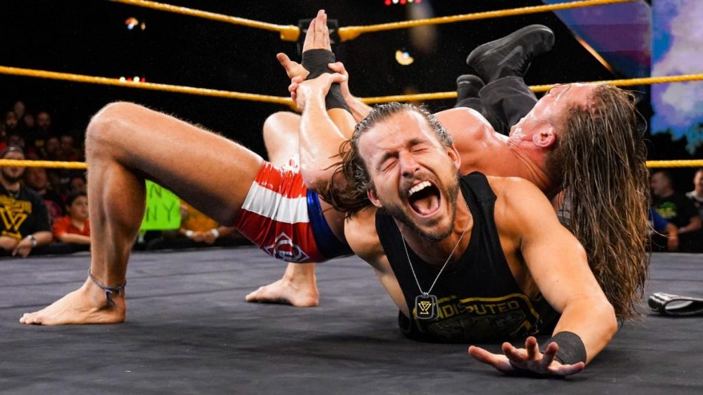 Matt Riddle with an armbar on Adam Cole