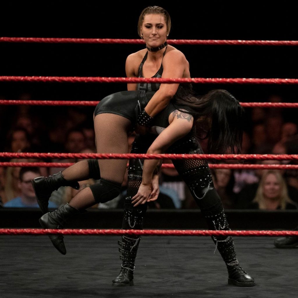 Rhea Ripley manhandles Debbie Keitel