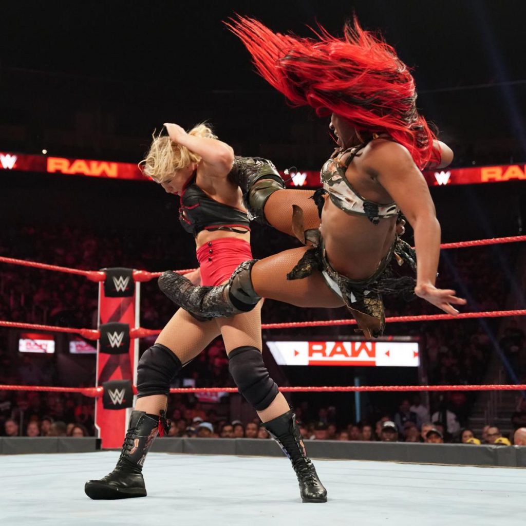 Ember Moon dropkicks Lacey Evans