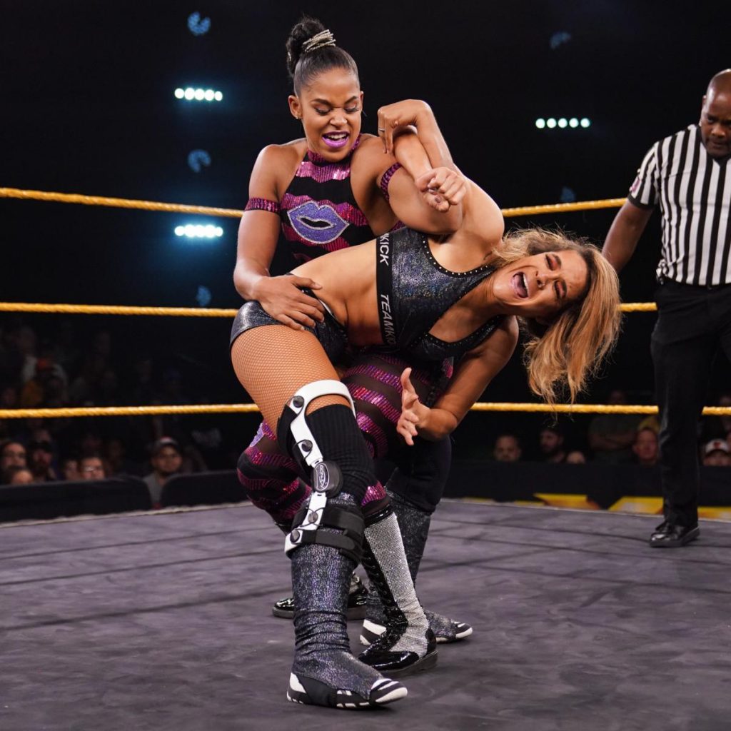 Bianca Belair stretches Dakota Kai