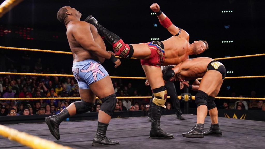 Dominik Dikakovic holds Roderick Strong and kicks Keith Lee