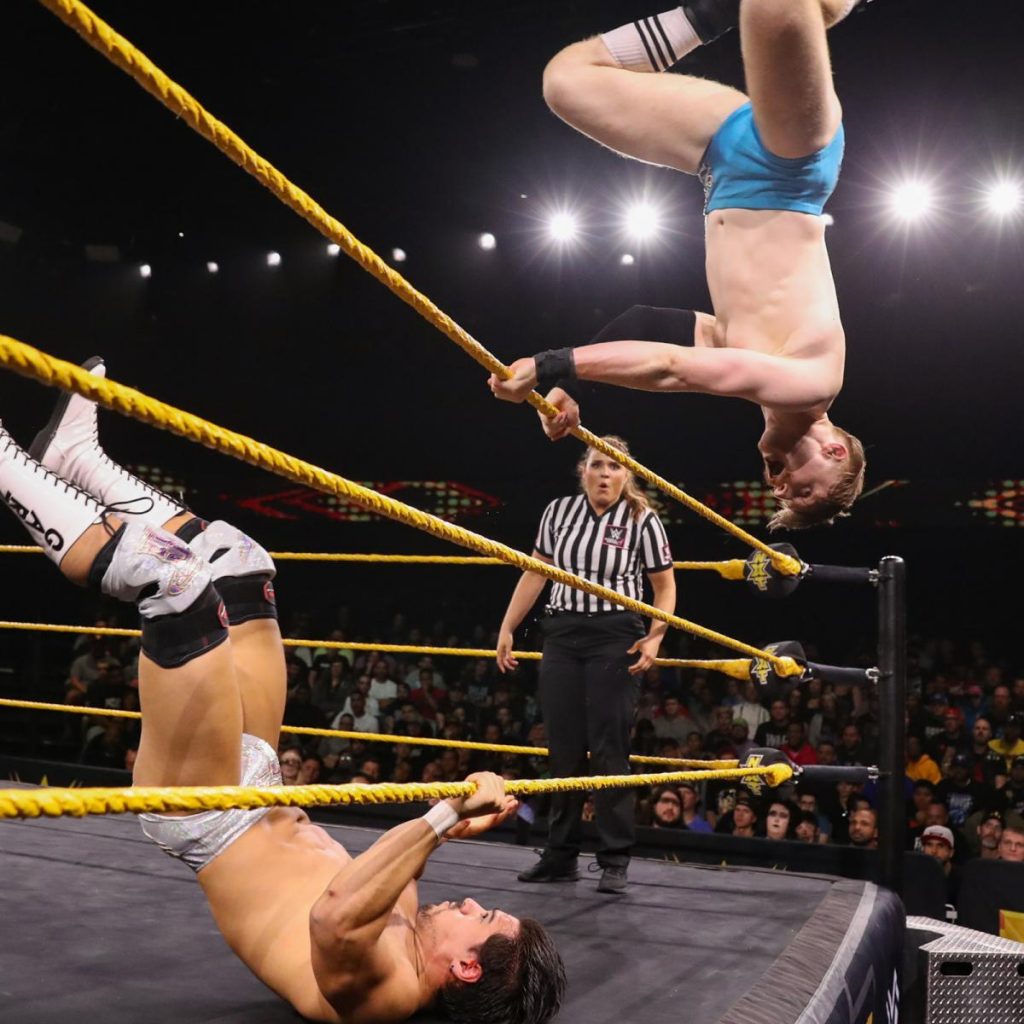 Angel Garza and Jack Gallagher mid-move