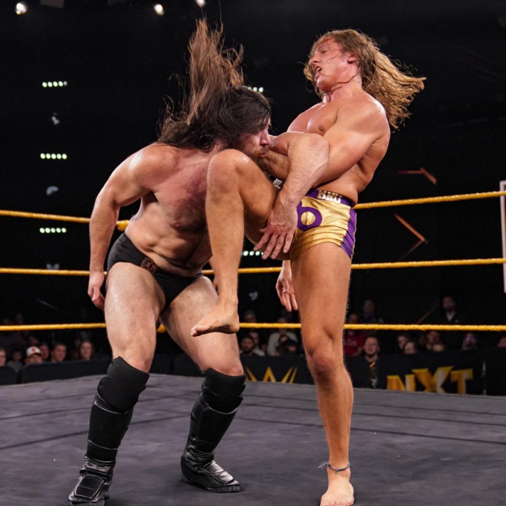 Matt Riddle knees Cameron Grimes in the face