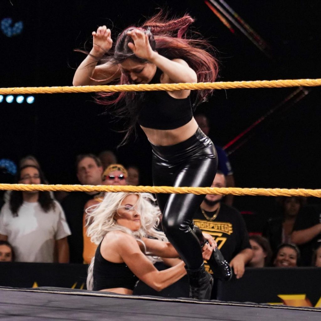 Candice LeRae pulls Io Shirai off the apron