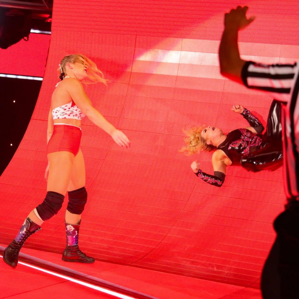 Lacey Evans throws Natalya into the backboard