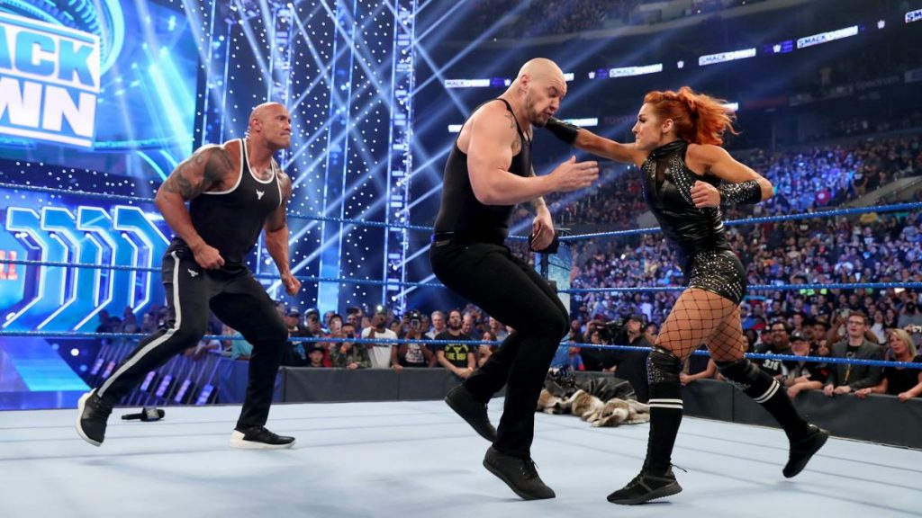 Becky Lynch and The Rock beat up Baron Corbin