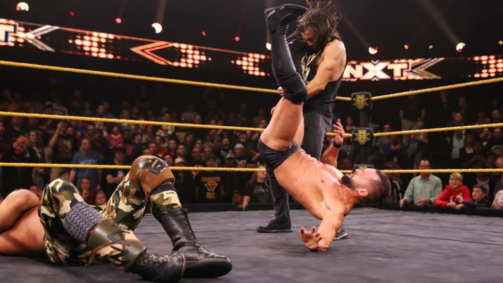 Finn Balor Pele kicks Adam Cole
