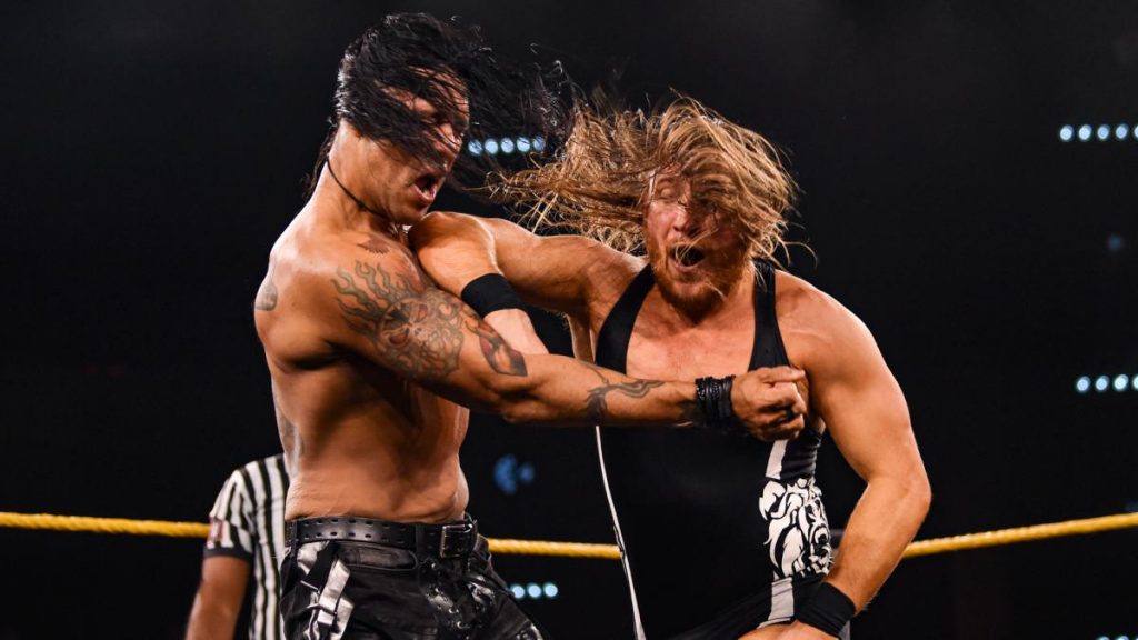 Pete Dunne and Damia Priest chop each other