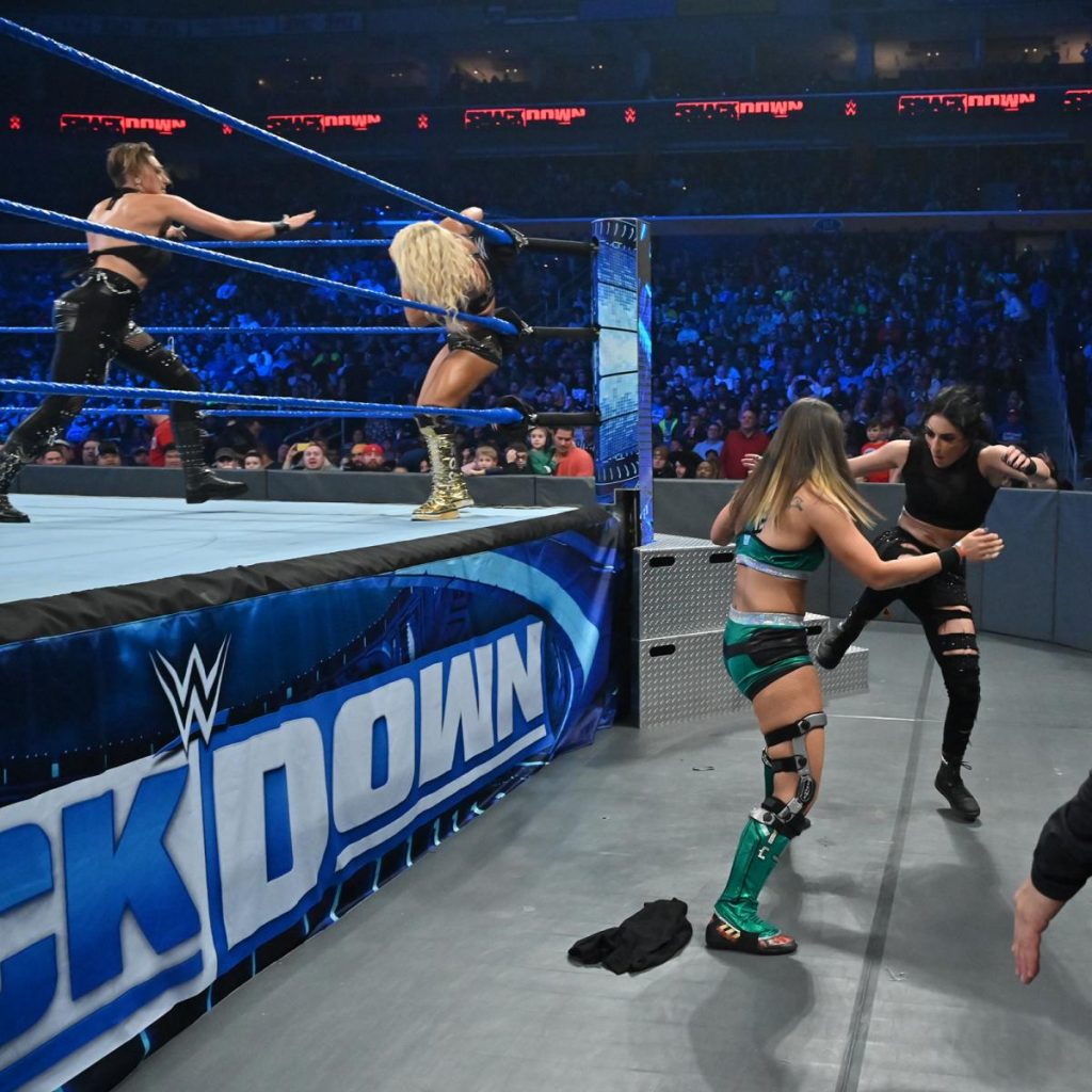 Tegan Nox fights Sonya Deville at ringside while Mandy Rose gets beaten up by Rhea Ripley in the ring