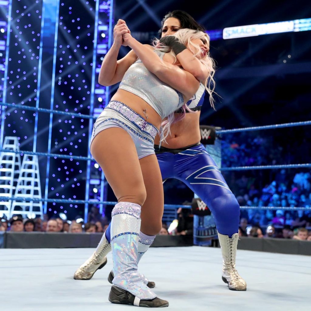 Bayley with Dana Brooke in hold