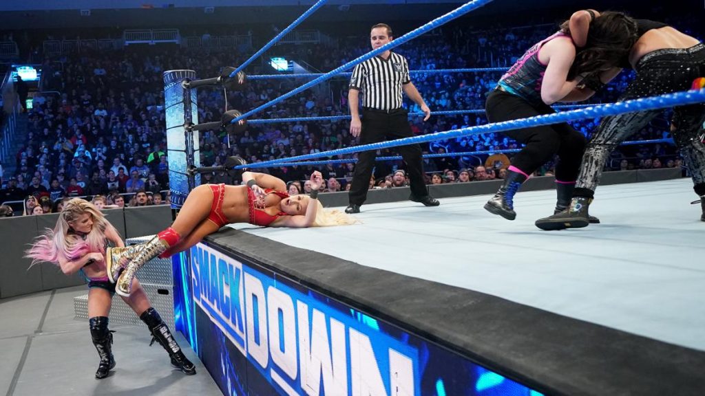 Alexa Bliss pulls Mandy Rose out of the ring so Nikki Cross ca pi Sonya Deville