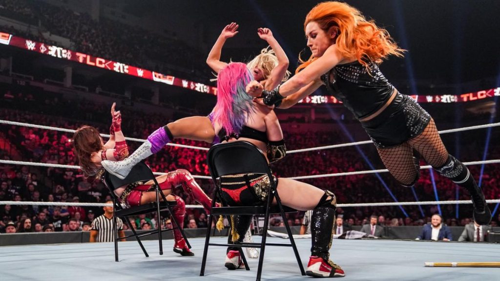 Flair and Lynch knock Asuka and Kairi Sane off chairs