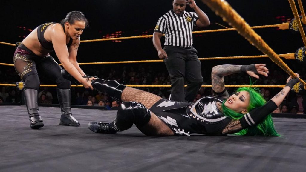 Shaya Baszler drags Shotzi Blackheart away from the ropes