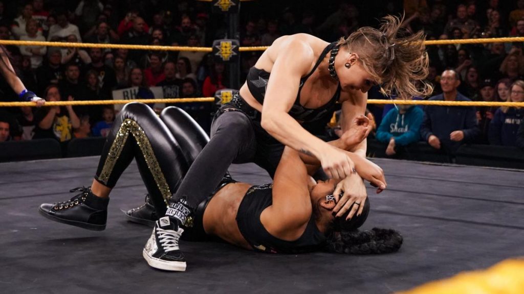 RHea Ripley pounds on Bianca Belair