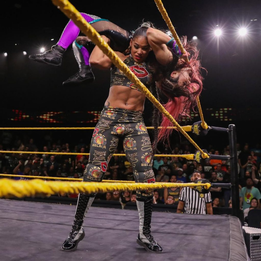 Bianca Belair throws Io Shirai over the top rope to win the battle royal