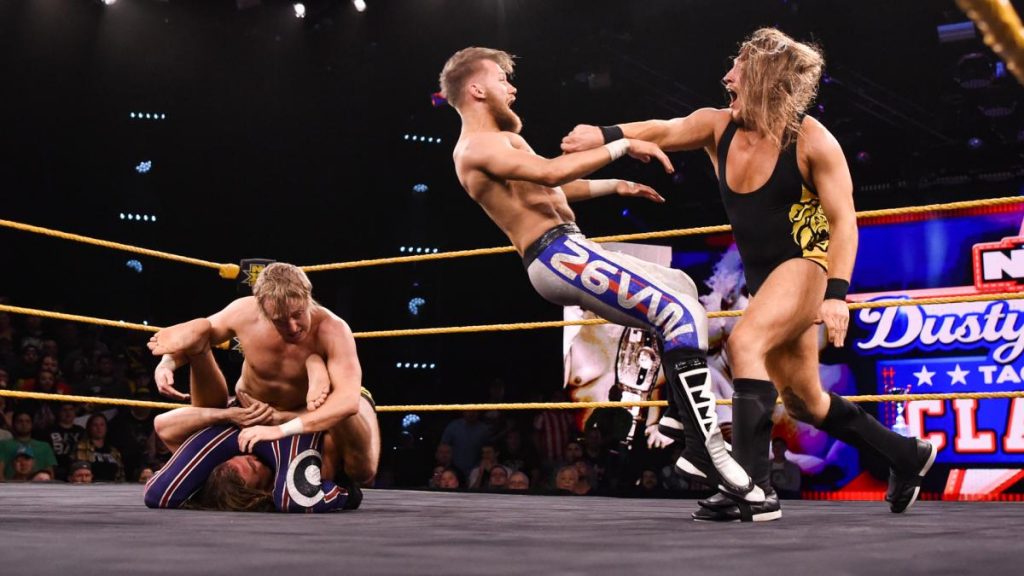 Pete Dunne punches Mark Adrews onto Matt Riddle and Flash Morgan Webster