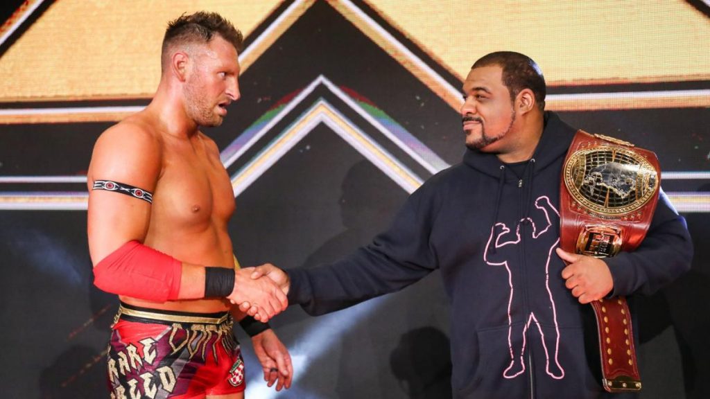 Dominik Dijakovic and Keith Lee shake hands