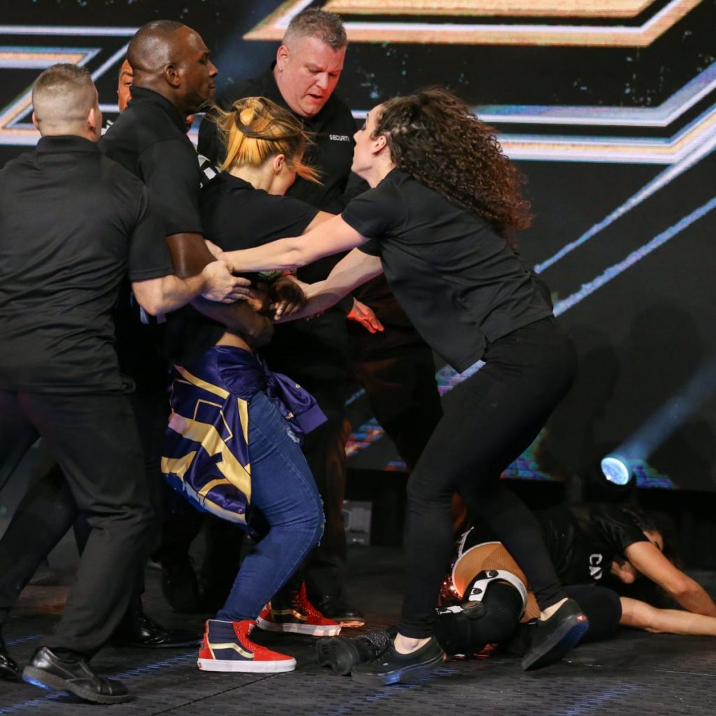 Tegan Nox is dragged off Dakota Kai