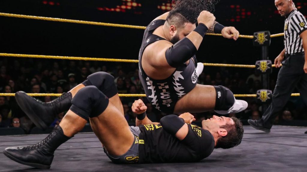 Bronson Reed drops an elbow on Roderick Strong