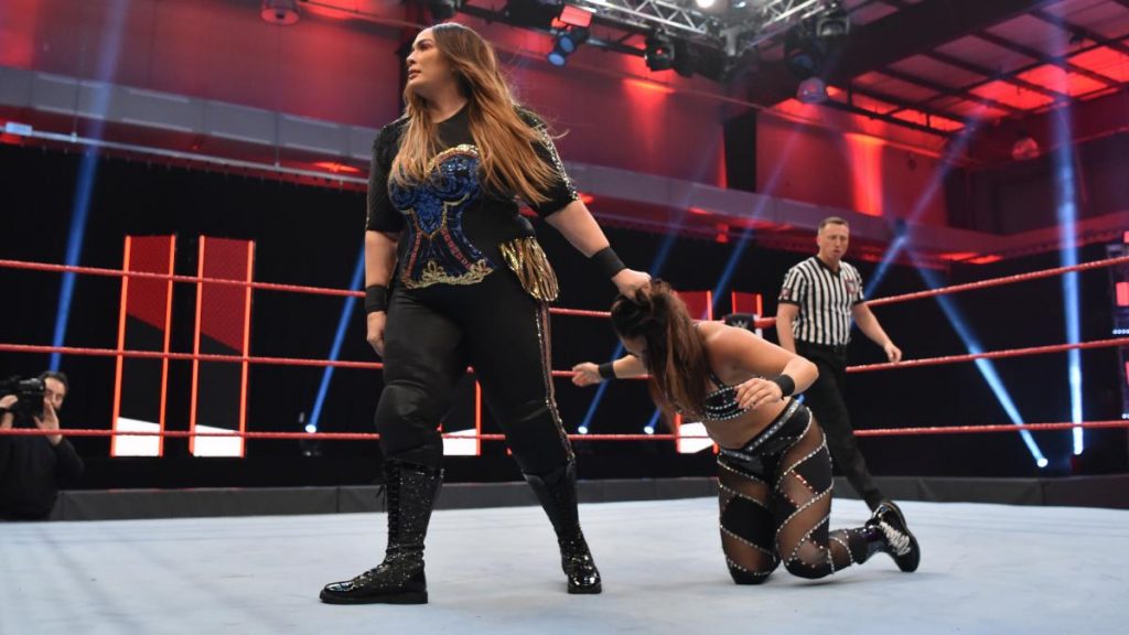 Nia Jax drags Deonna Purrazo by the hair