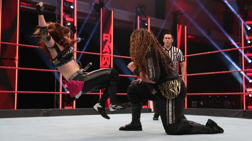 Kairi Sane dropkicks Nia Jax
