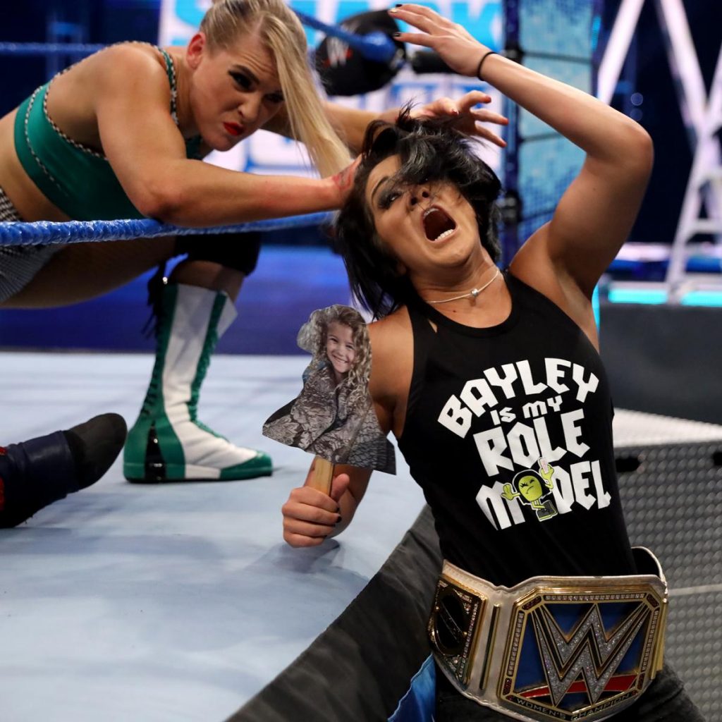 Lacey Evans grabs Bayley by the hair