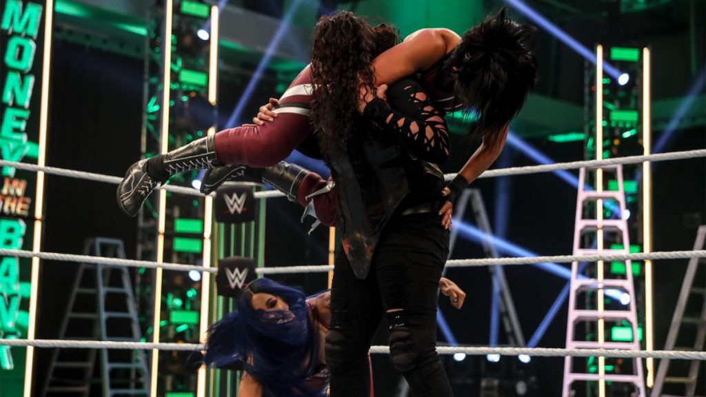 Sasha Banks saves Bayley by chop blocking Tamina after the Money in the Bank match