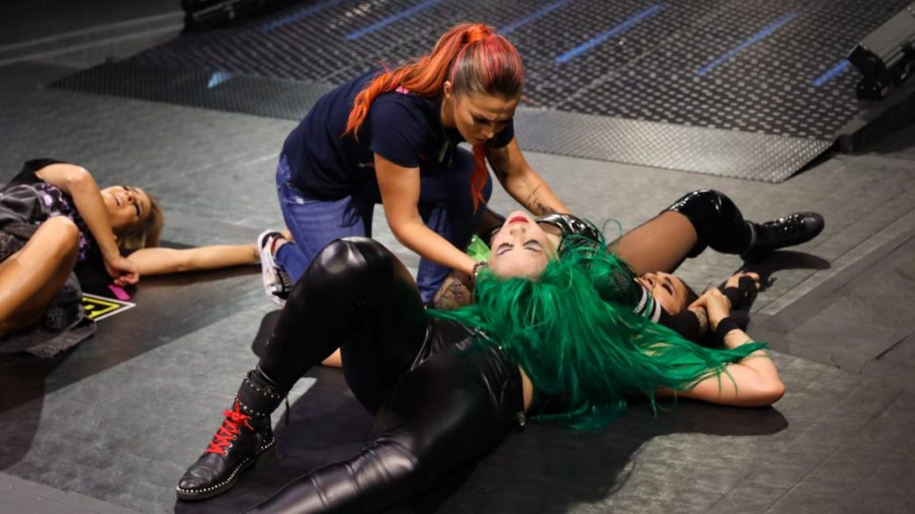 Tegan Nox tends to Shotzi Blackheart after her scary landing