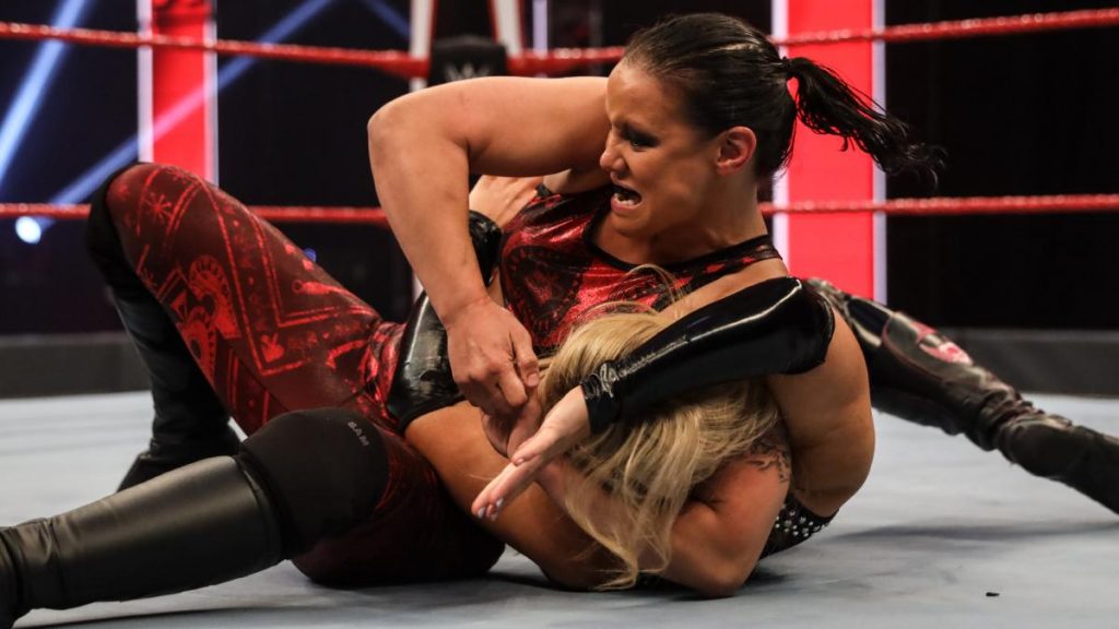 Shayna Baszler with Natalya in a submission