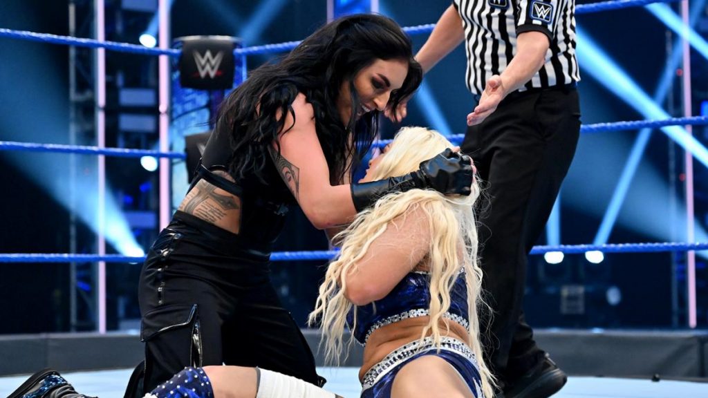 Sonya Deville with Mandy Rose by the hair