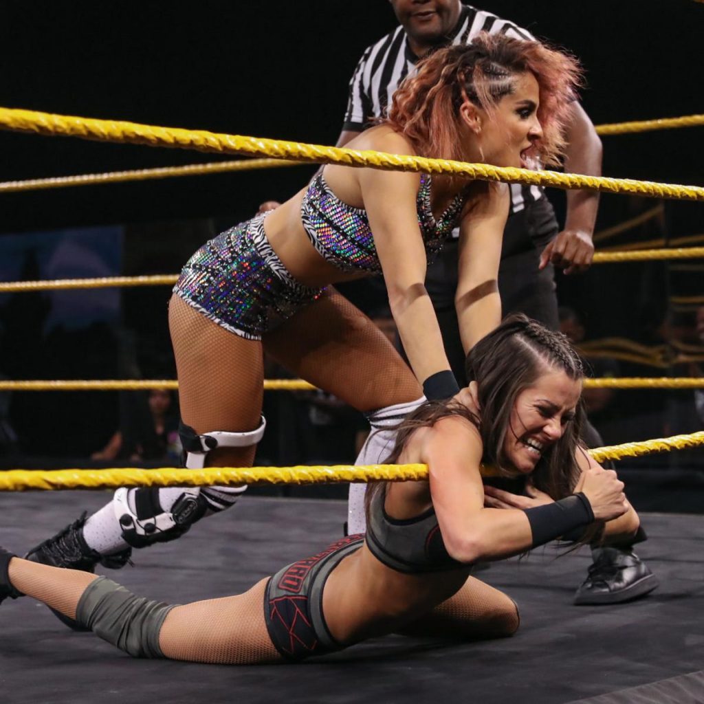 Dakota Kai presses Kacy Catanzaro into the ropes