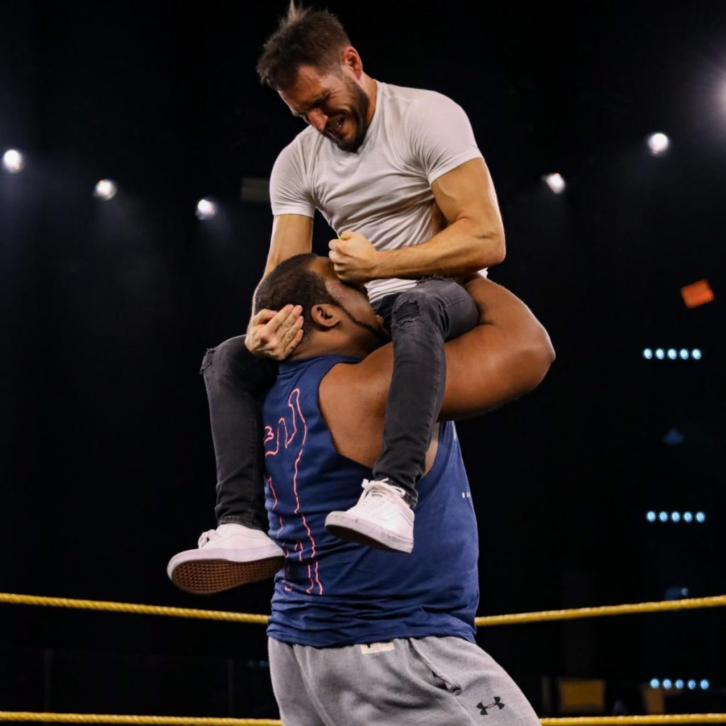 Johnny Gargano sticks a car key in Keith Lee's eye to avoid a spirit bomb