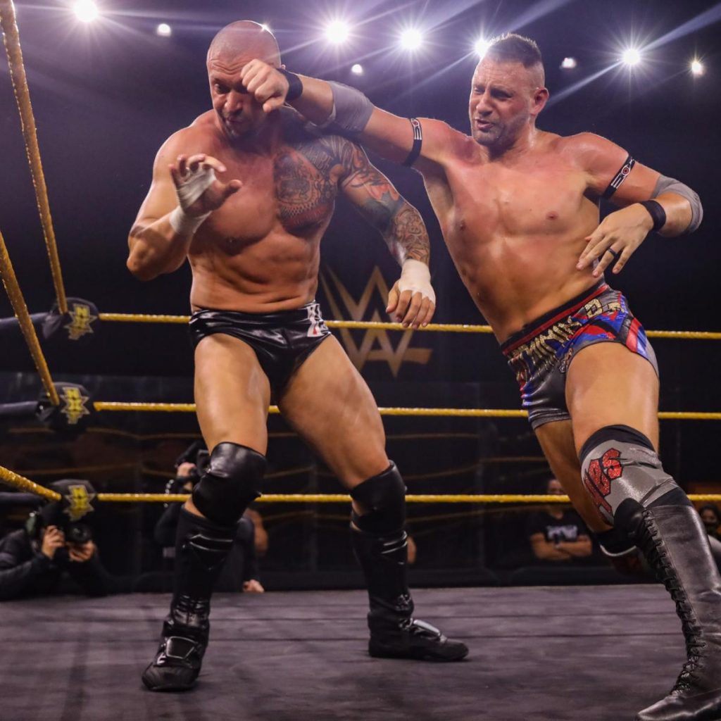 Dominik Dijakovic forearms Karrion Kross