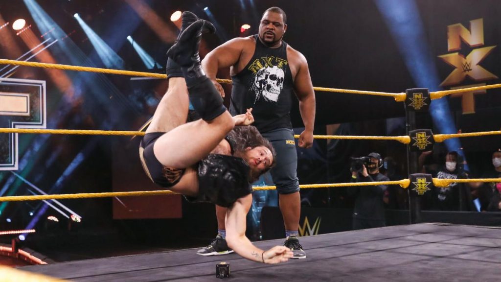 Keith Lee throws Cameron Grimes around
