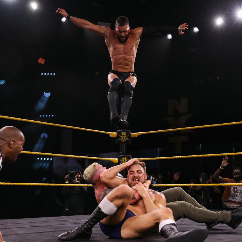 Finn Balor's Coup de Grace breaks up Dexter Lumis' submission on Timothy Thatcher