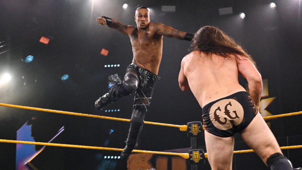 Damian Priest flies at Cameron Grimes