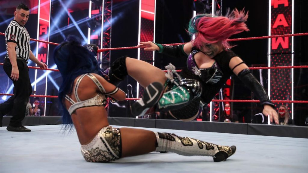Asuka crashes into Sasha Banks