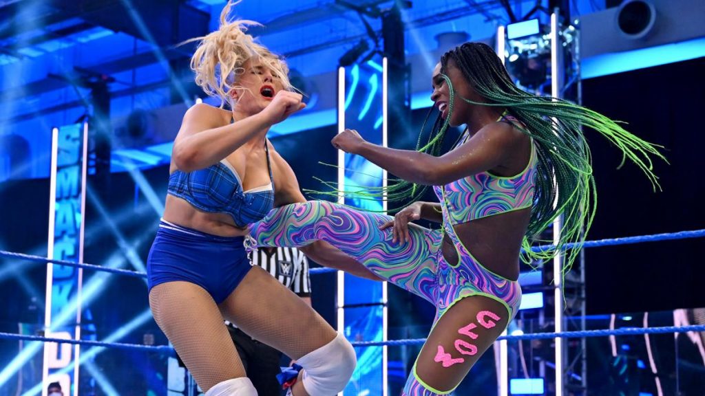 Naomi kicks Lacey Evans
