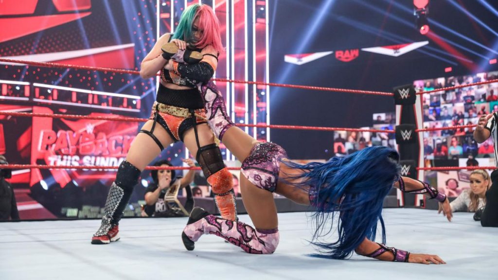 Asuka with Sasha Banks in an ankle lock