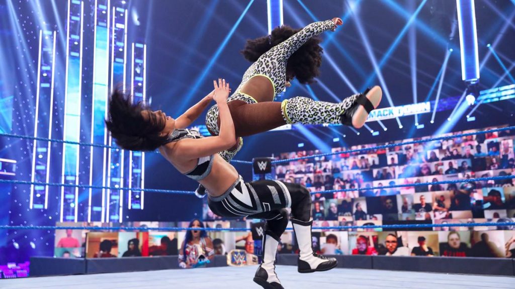 Naomi gives Bayley the Rear View