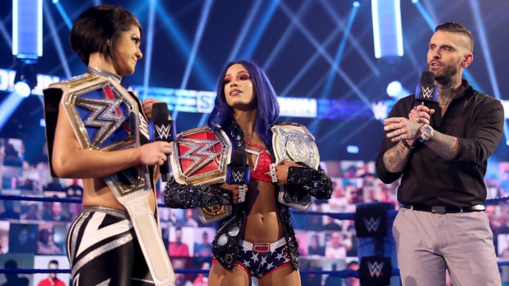 Bayley, Sasha Banks, and Corey Graves