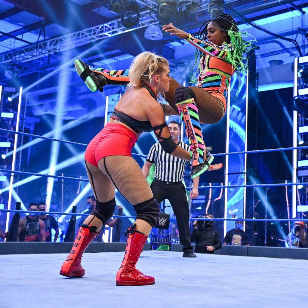 Naomi leaps at Lacey Evans