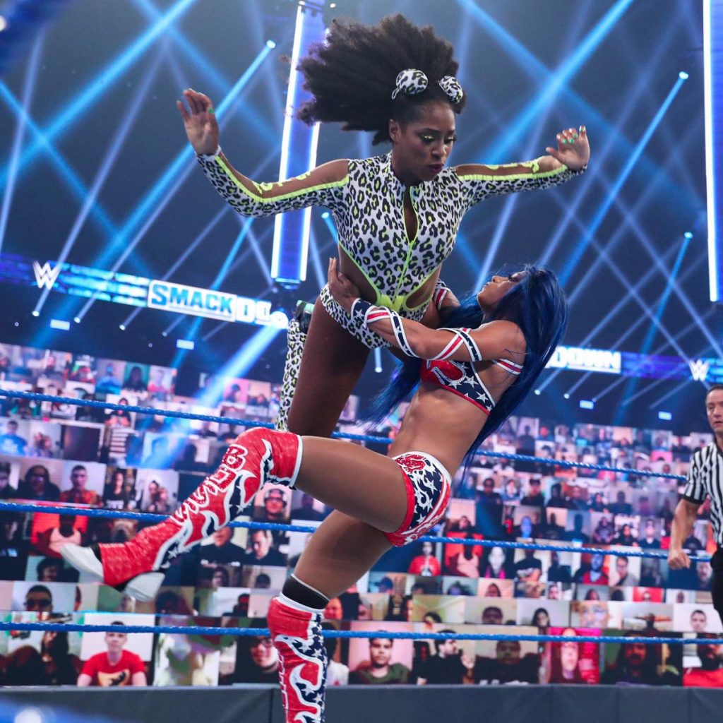 Naomi crossbody's Sasha Banks