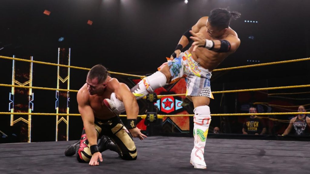 Kushida kicks Austin Theory's injured arm