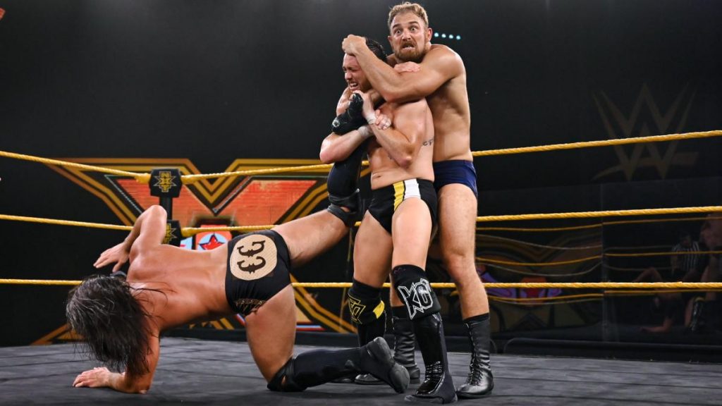 Timothy Thatcher tries to submit Kyle O'Reilly while O'Reilly tries to submit Cameron Grimes