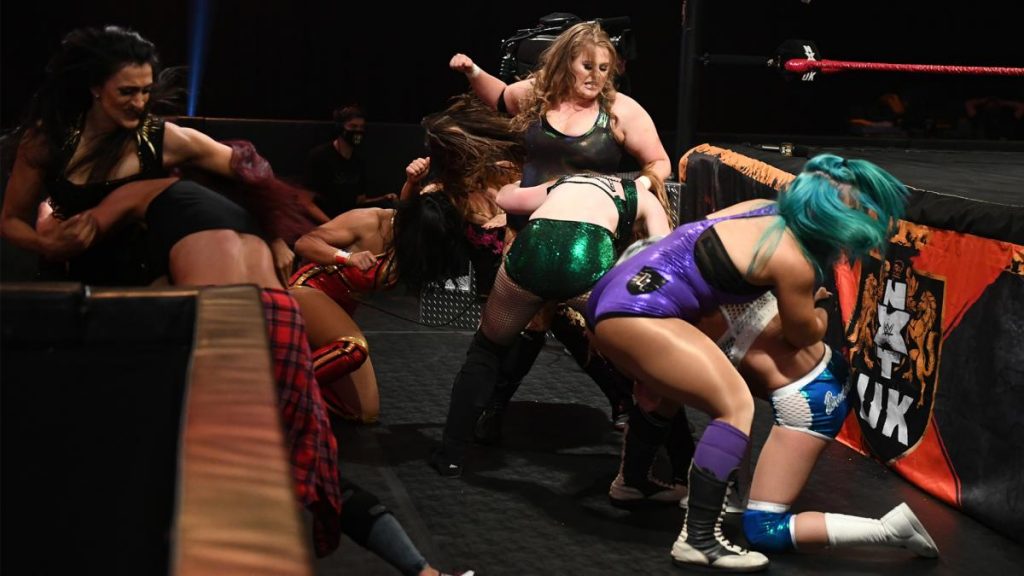 The NXT UK women's division brawl at ringside