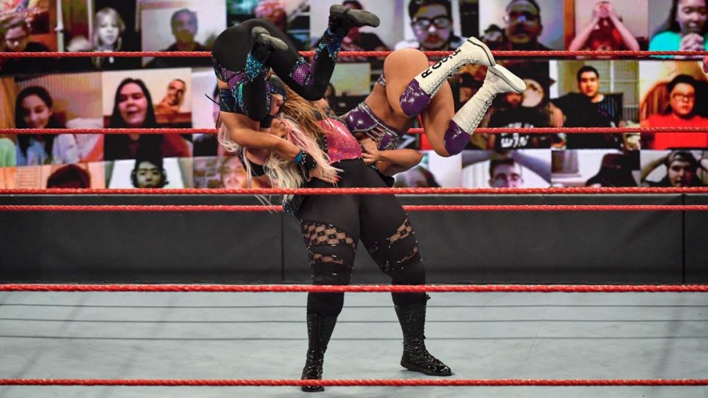 NIa Jax suplexes Dana Brooke and Mandy Rose