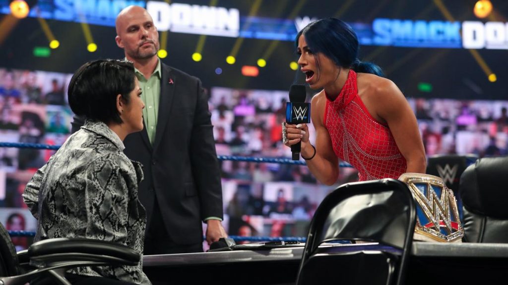 Sasha Banks and Bayley during their contract signing