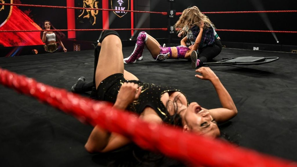 Piper Niven gives Aleah James a Michinoku Driver with Jiiny laying in the foreground and Kay Lee Rae watching on