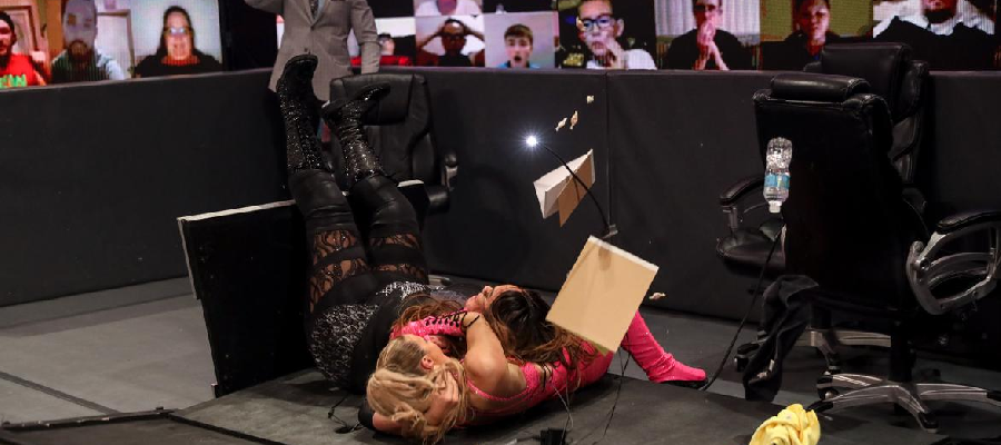 Nia Jax puts Lana through the announce desk again